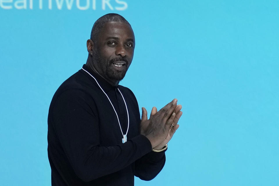 British actor Idris Elba arrives on stage during the World Government Summit in Dubai, United Arab Emirates, Tuesday, Feb. 14, 2023. While on stage, Elba brought up the persistent discussions about him taking over as Ian Fleming's famed British spy 007. (AP Photo/Kamran Jebreili)