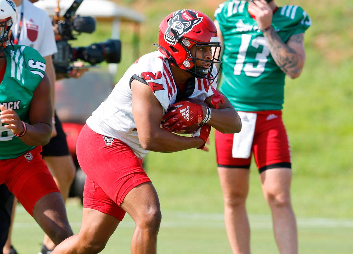 N.C. State running back Michael Allen (24) runs a drill during the Wolfpack’s first practice of fall camp in Raleigh, N.C., Wednesday, August 3, 2022.