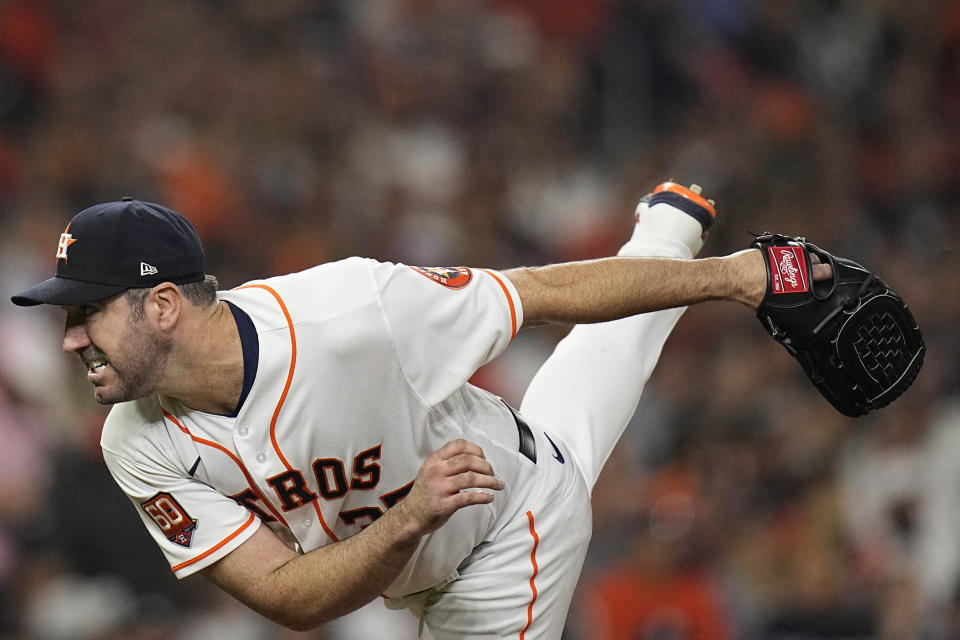 Houston Astros starting pitcher Justin Verlander (35) works during the fifth inning in Game 1 of baseball's American League Championship Series between the Houston Astros and the New York Yankees, Wednesday, Oct. 19, 2022, in Houston. (AP Photo/Eric Gay)