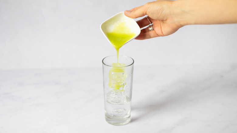 honey dew puree going into glass 