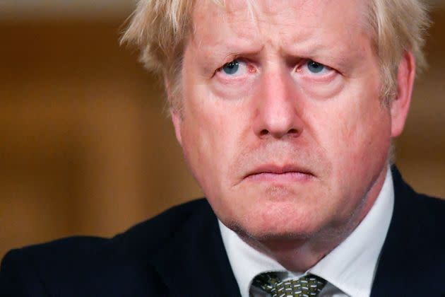 Boris Johnson looks on during a coronavirus briefing in Downing Street. (Photo: via Associated Press)