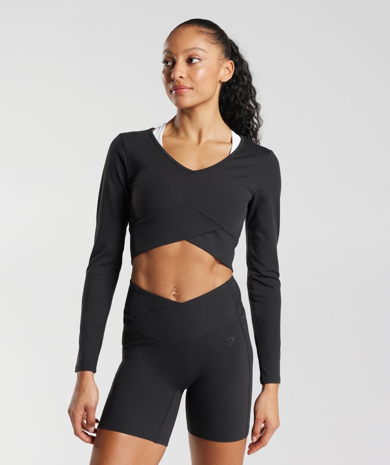 <p><a href="https://go.redirectingat.com?id=74968X1596630&url=https%3A%2F%2Fwww.gymshark.com%2Fproducts%2Fgymshark-crossover-long-sleeve-crop-top-black-ss23&sref=https%3A%2F%2Fwww.harpersbazaar.com%2Ffashion%2Ftrends%2Fa45457105%2Fblack-friday-cyber-monday-fashion-deals-2023%2F" rel="nofollow noopener" target="_blank" data-ylk="slk:Shop Now;elm:context_link;itc:0;sec:content-canvas" class="link rapid-noclick-resp">Shop Now</a></p><p>Crossover Long Sleeve Crop Top Black</p><p>gymshark.com</p><p>$15.20</p>