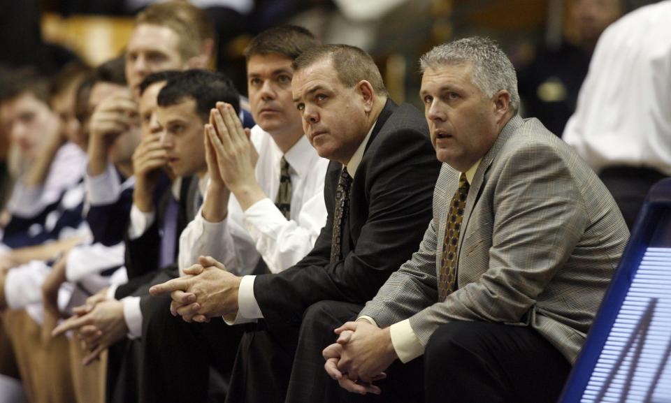 BYU coaches from right, John Wardenburg, Dave Rose and Rave Rice as BYU faces Western Oregon at the Marriott Center in Provo on Jan. 6, 2009. Wardenburg has returned to BYU and will be an assistant on Amber Whiting’s women’s basketball staff. | Jason Olson, Deseret News