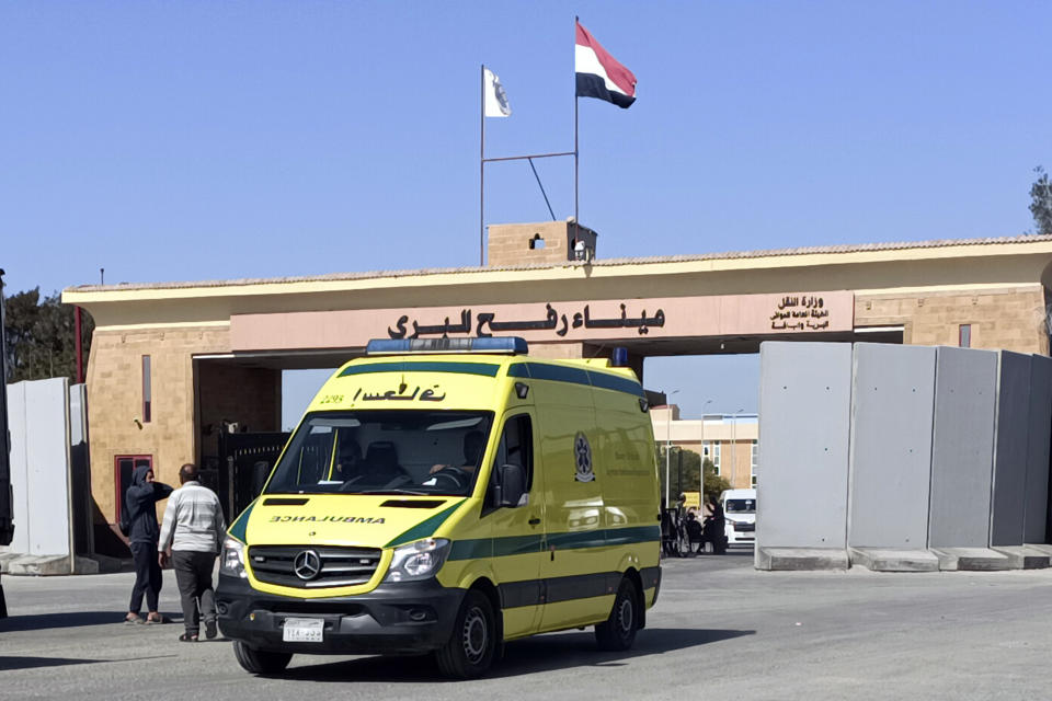 An ambulance carrying bodies of the foreign humanitarian aid workers killed in a recent Israeli airstrike in Gaza crosses the Rafah border crossing between Egypt and the Gaza Strip, Wednesday, April 3, 2024. (AP Photo/Ahmed Abudraa)