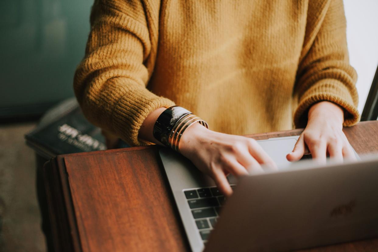  Person at a computer (hands). 