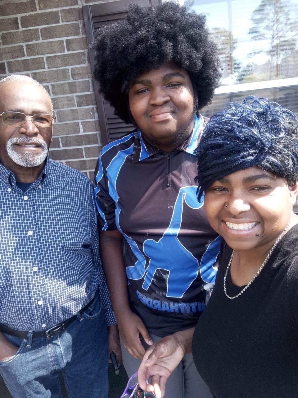 Dykashie “Kash” Harris with his mother, Tiffany Harris, and grandfather, Frank Breece.