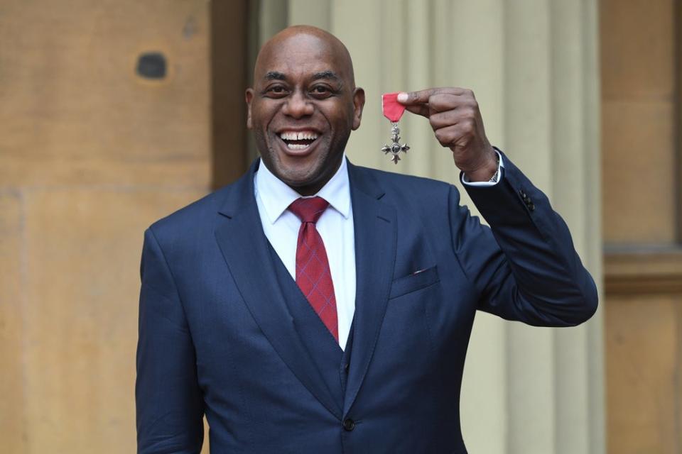 Ainsley Harriott with his MBE at Buckingham Palace in 2020 (PA)