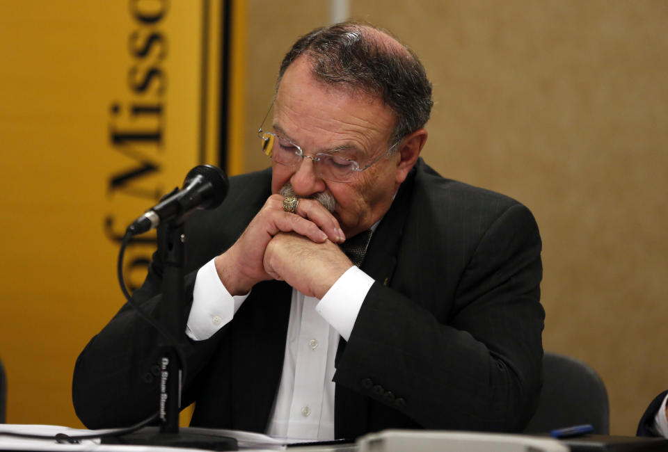 University of Missouri Chancellor R. Bowen Loftin pauses during a news conference Friday, April 11, 2014, in Rolla, Mo. The news conference was held to discuss an outside legal review of the university's response to a case involving school swimmer Sasha Menu Courey, who killed herself 16 months after an alleged off-campus rape by as many as three football players in February 2010. (AP Photo/Jeff Roberson)