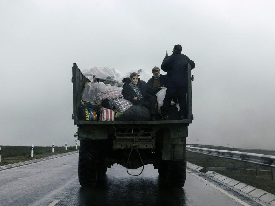 A vehicles carries refugees from Nagorno-Karabakhb as they arrive in Kornidzor, Armenia, on Sept. 25.<span class="copyright">Nanna Heitmann—The New York Times/Redux</span>