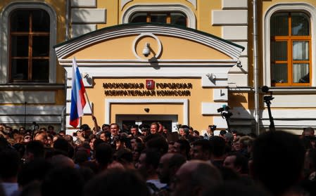 People attend a rally against alleged violations ahead of elections to Moscow City Duma in Moscow