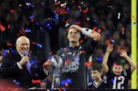 <p>FEB. 5, 2017 – Tom Brady #12 of the New England Patriots holds the Vince Lombardi Trophy after defeating the Atlanta Falcons 34-28 in overtime during Super Bowl 51 at NRG Stadium in Houston, Texas. (Photo: Mike Ehrmann/Getty Images) </p>