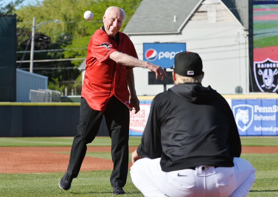 Erie native and NFL Hall of Fame receiver Fred Biletnikoff throws out the first pitch at an Erie SeaWolves game at UPMC Park on May 25. Biletnikoff attended numerous events during the week marking the dedication of the Erie School District's Biletnikoff Field .
