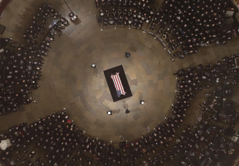 Palebearers carry the casket of Former President George H. W. Bush into the U.S. Capitol Rotunda Monday, Dec. 3, 2018, in Washington. (Photo: Morry Gash/Pool via AP)