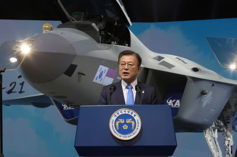 South Korean President Moon Jae-in delivers his speech in front of a prototype of the country's first homegrown fighter jet called KF-21 during its rollout ceremony in Sacheon