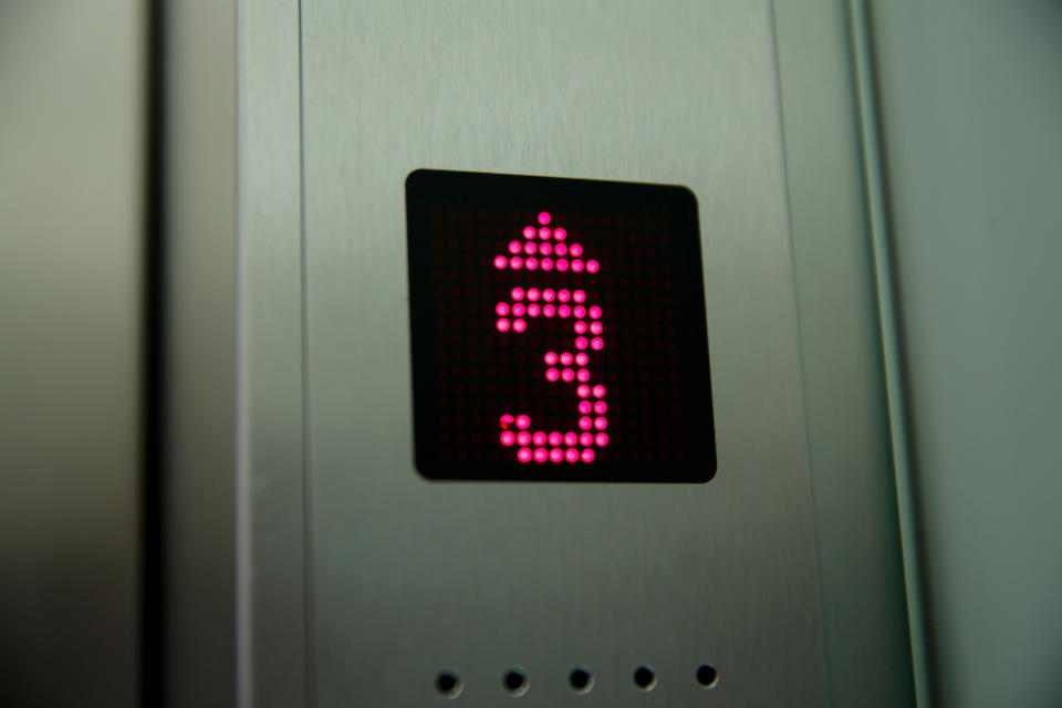 Illuminated Number 3 Sign In Elevator