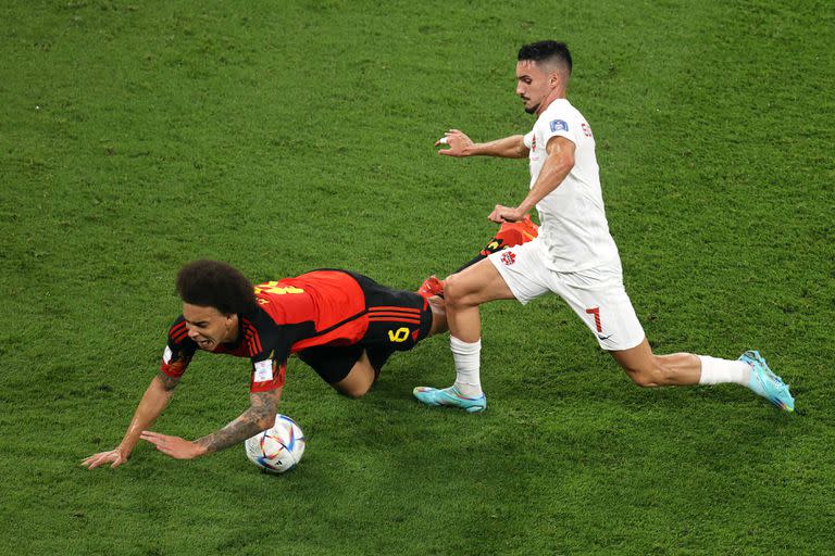 DOHA, QATAR - NOVEMBER 23: Axel Witsel of Belgium is tackled by Stephen Eustaquio of Canada during the FIFA World Cup Qatar 2022 Group F match between Belgium and Canada at Ahmad Bin Ali Stadium on November 23, 2022 in Doha, Qatar. (Photo by Charlotte Wilson/Offside/Offside via Getty Images)