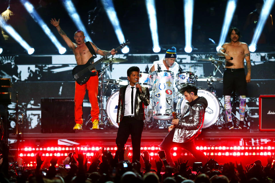 Bruno Mars peforms withe the Red Hot Chili Peppers during the Pepsi Super Bowl XLVIII Halftime Show at MetLife Stadium on February 2, 2014 in East Rutherford, New Jersey. (Photo by Elsa/Getty Images)