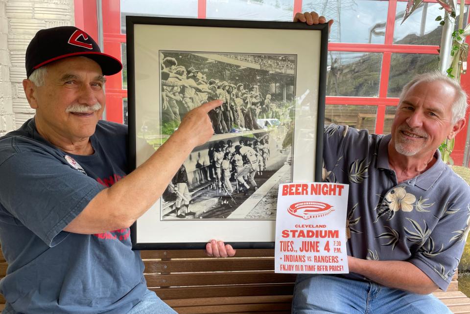 Firestone High School graduates Jess Ennis, left, and Greg Miller attended 10-cent beer night on June 4, 1974, at Cleveland Stadium. Ennis and Miller stood atop the Texas Rangers dugout during the mayhem in Cleveland.