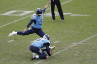 Tennessee Titans kicker Stephen Gostkowski (3) attempts a 45-yard field goal against the Pittsburgh Steelers as Brett Kern (6) holds in the final seconds of the fourth quarter of an NFL football game Sunday, Oct. 25, 2020, in Nashville, Tenn. Gostkowski missed the kick and the Steelers won 27-24. (AP Photo/Wade Payne)