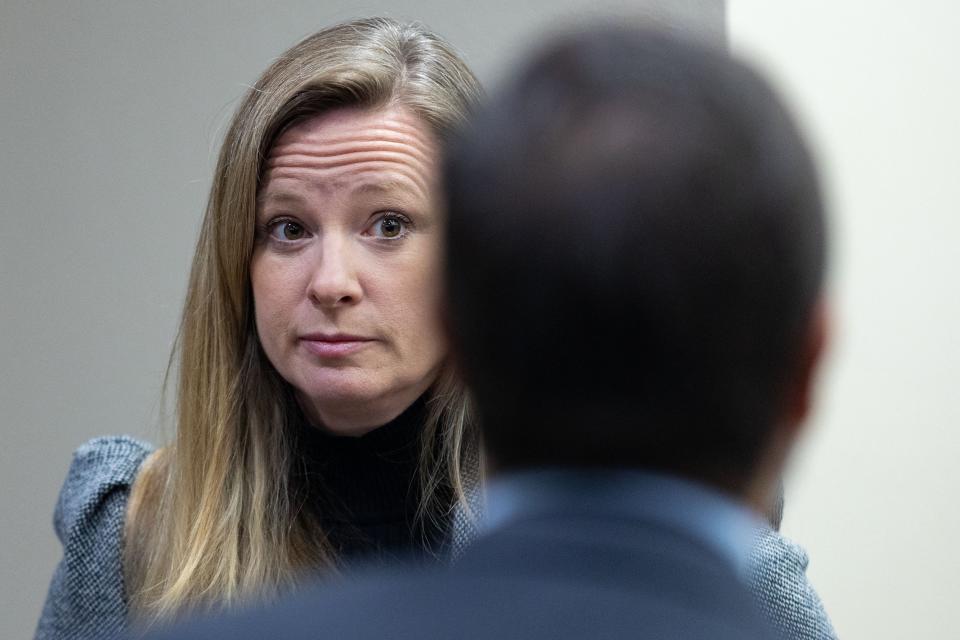 Assistant State Attorney Georgia Cappleman speaks with defendant Charlie Adelson’s attorney Daniel Rashbaum after a bond hearing concluded for Adelson on Friday, Sept. 9, 2022. Adelson is accused of orchestrating and financing the murder of Florida State University law professor Dan Markel. 