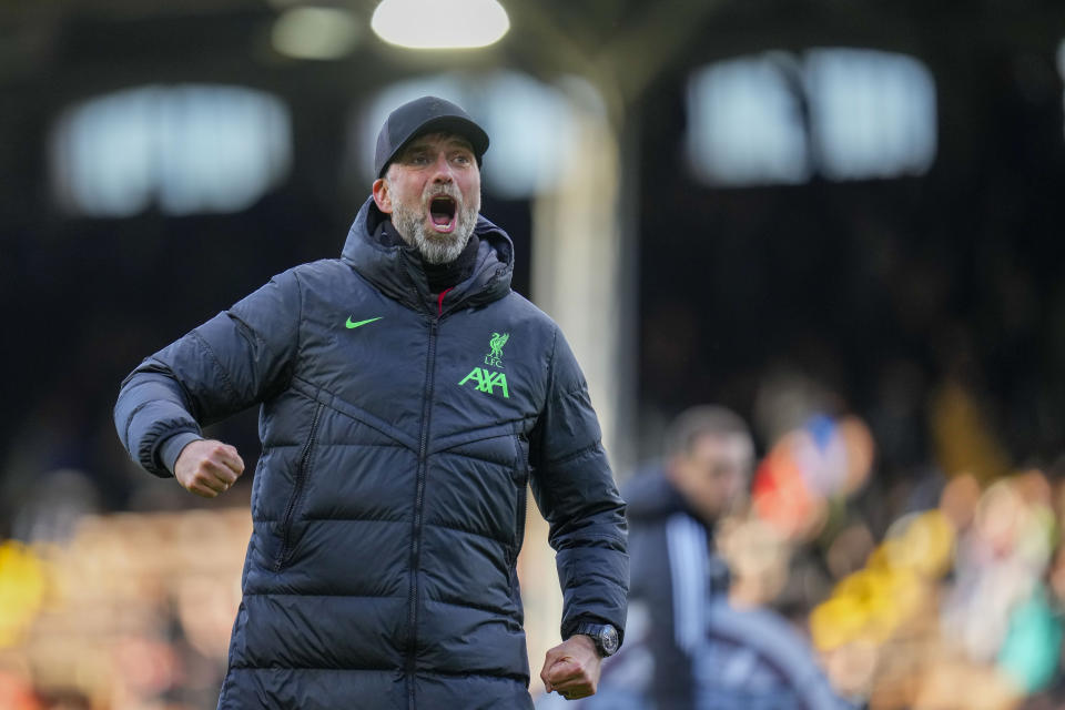 Liverpool's manager Jurgen Klopp celebrates at the end of the English Premier League soccer match between Fulham and Liverpool at Craven Cottage stadium in London, Sunday, April 21, 2024. (AP Photo/Kirsty Wigglesworth)