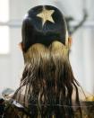 <p>Take a can of black hair spray paint and Halloween is your oyster.</p>