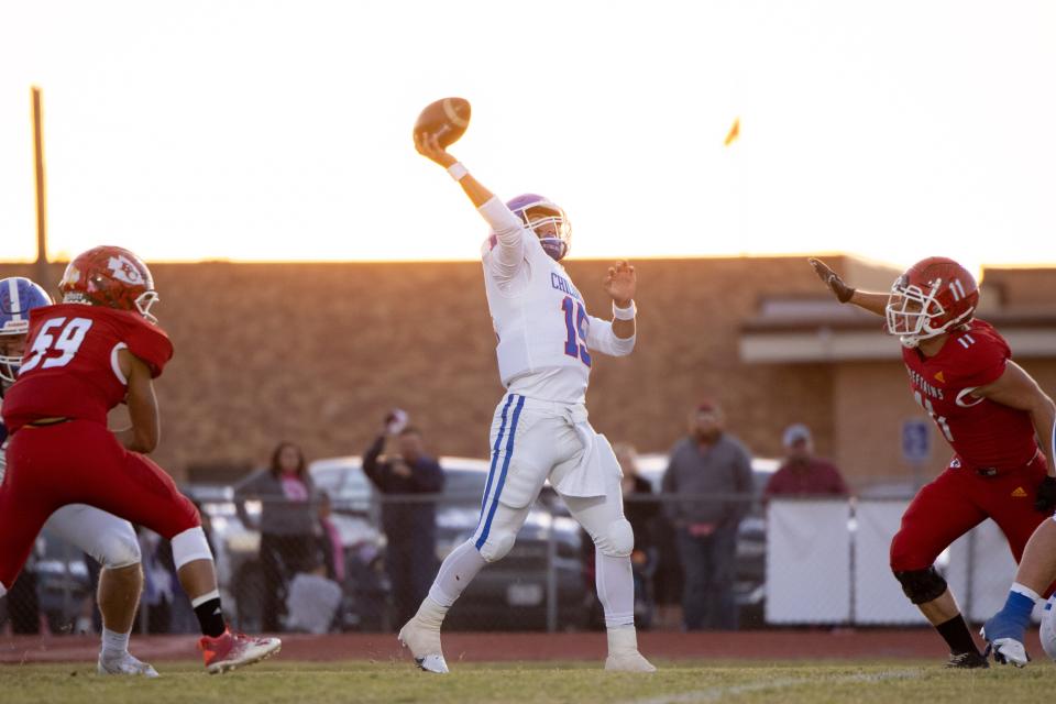 Childress’ Collin Bishop (15) mid pass during a district game Friday, October 15th, Childress at Friona in Friona.