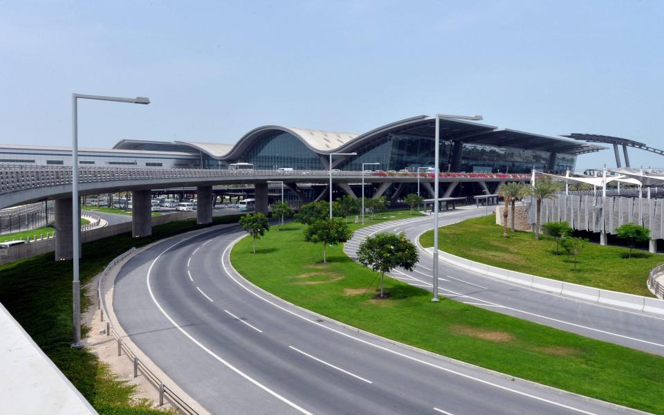 Doha's Hamad airport features a spacious, modern terminal complete with lush internal gardens - EPA/STR