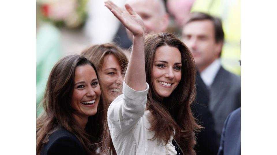 Princess Kate waving with her mother Carole and sister Pippa