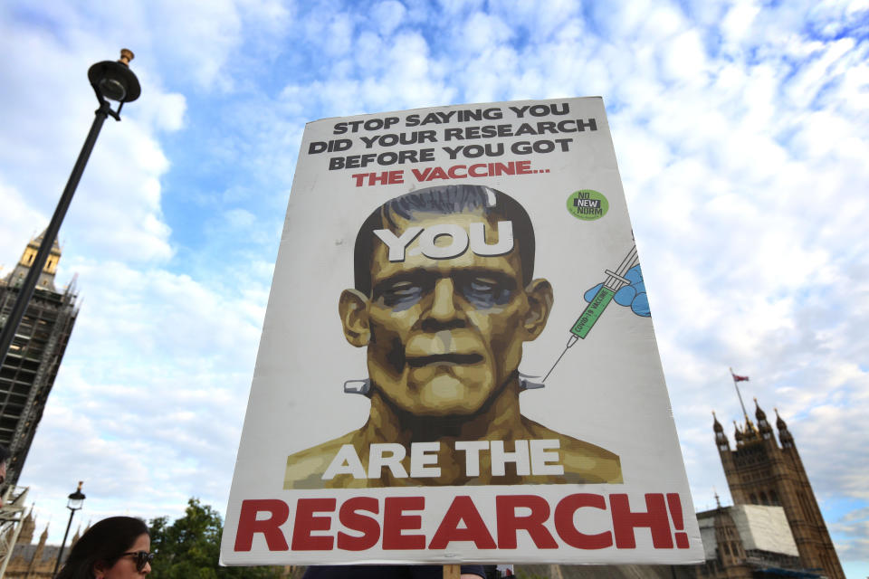 <p>LONDON, UNITED KINGDOM - 2021/09/18: A protester holds a placard as protesters march from Regent's Park to Downing Street at the World Wide Rally for Freedom. They march for their children and against child vaccination, Vaccine passports and future lockdowns. (Photo by Martin Pope/SOPA Images/LightRocket via Getty Images)</p>
