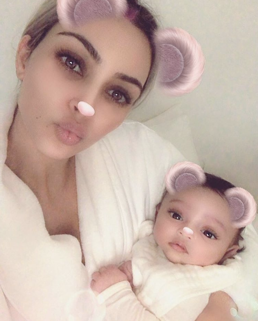 <p>Making her debut on her mama’s socia media — with a Snapchat filter, naturally — Chicago West brought all the cuteness in this matchy-matchy photo. Born just five weeks ago to a surrogate, Kimye’s newest cutie has her mother’s eyes — and her knack for causing an internet frenzy. (Photo: <a rel="nofollow noopener" href="https://www.instagram.com/p/BfrP5WDFmWd/?taken-by=kimkardashian" target="_blank" data-ylk="slk:Kim Kardashian via Instagram;elm:context_link;itc:0;sec:content-canvas" class="link ">Kim Kardashian via Instagram</a>) </p>