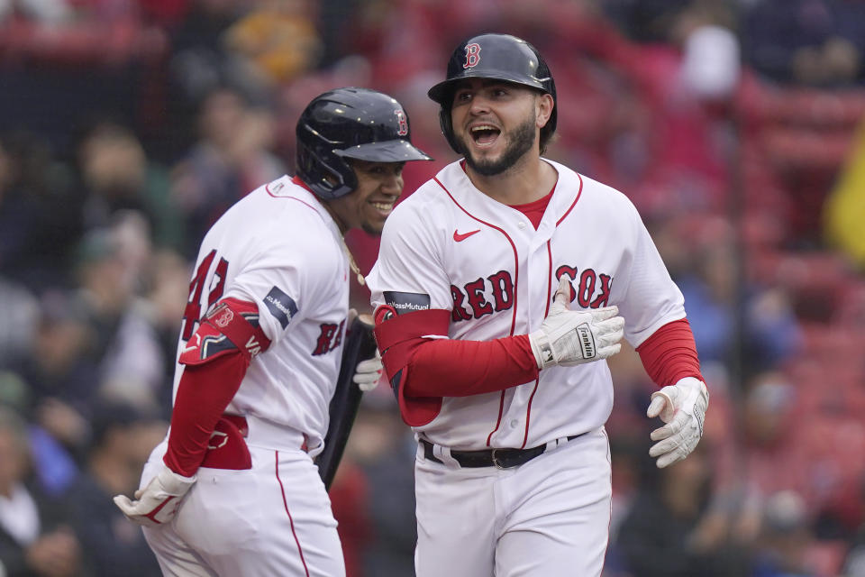 Boston Red Sox's Wilyer Abreu, right, celebrates with Enmanuel Valdez, left, after scoring on a home run in the second inning of a baseball game against the Chicago White Sox, Sunday, Sept. 24, 2023, in Boston. (AP Photo/Steven Senne)