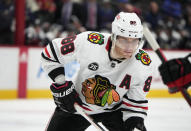 FILE - Chicago Blackhawks right wing Patrick Kane (88) prepares for play to resume during the second period of the team's NHL hockey game against the Colorado Avalanche on Jan. 24, 2022, in Denver. “I know a lot of people are counting this team out and what we can do, but I think we have a lot of motivated players and motivated coaching staff as well,” Kane said. (AP Photo/David Zalubowski, File)