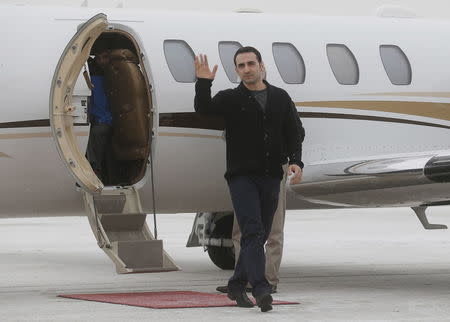 Former U.S. Marine Amir Hekmati, recently released from an Iranian prison, arrives at an airport in Flint, Michigan January 21, 2016. REUTERS/Rebecca Cook