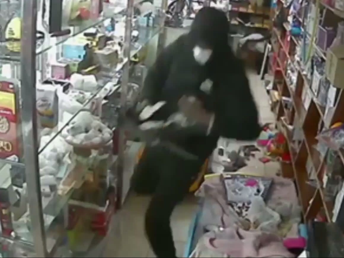 Video released by New York police, showing robbery on bodega  (NYPD)