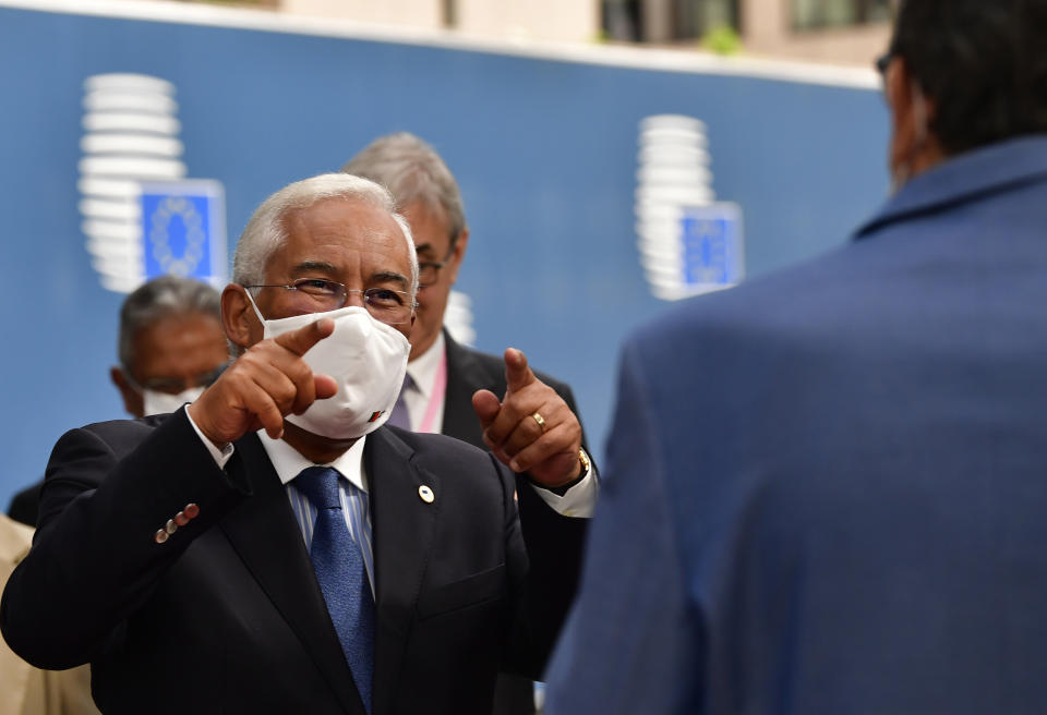 Portugal's Prime Minister Antonio Costa arrives for an EU summit at the European Council building in Brussels, Sunday, July 19, 2020. Leaders from 27 European Union nations meet face-to-face for a third day to assess an overall budget and recovery package spread over seven years estimated at some 1.75 trillion to 1.85 trillion euros. (John Thys, Pool Photo via AP)