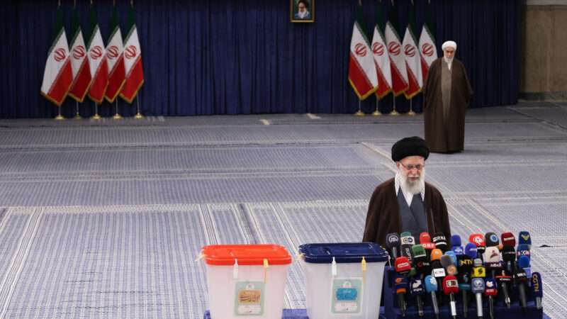 Iranian Supreme Leader Ayatollah Ali Khamenei speaks to the media after casting his vote during the parliamentary and assembly of experts elections at a polling station in Tehran.