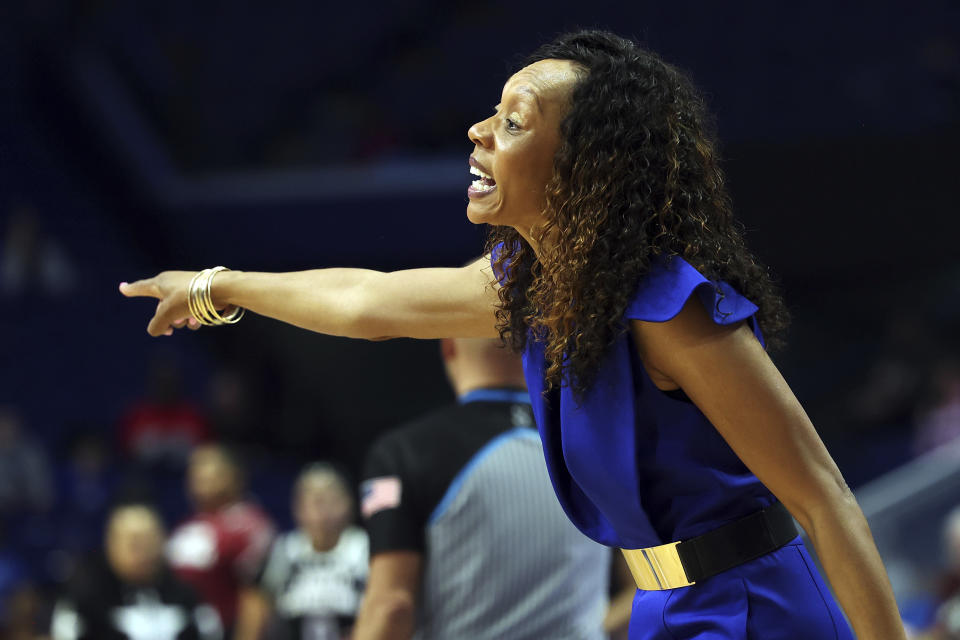 Kentucky head coach Kyra Elzy directs her team during the first half of an NCAA college basketball game against South Carolina, Sunday, Feb. 25, 2024, in Lexington, Ky. (AP Photo/James Crisp)