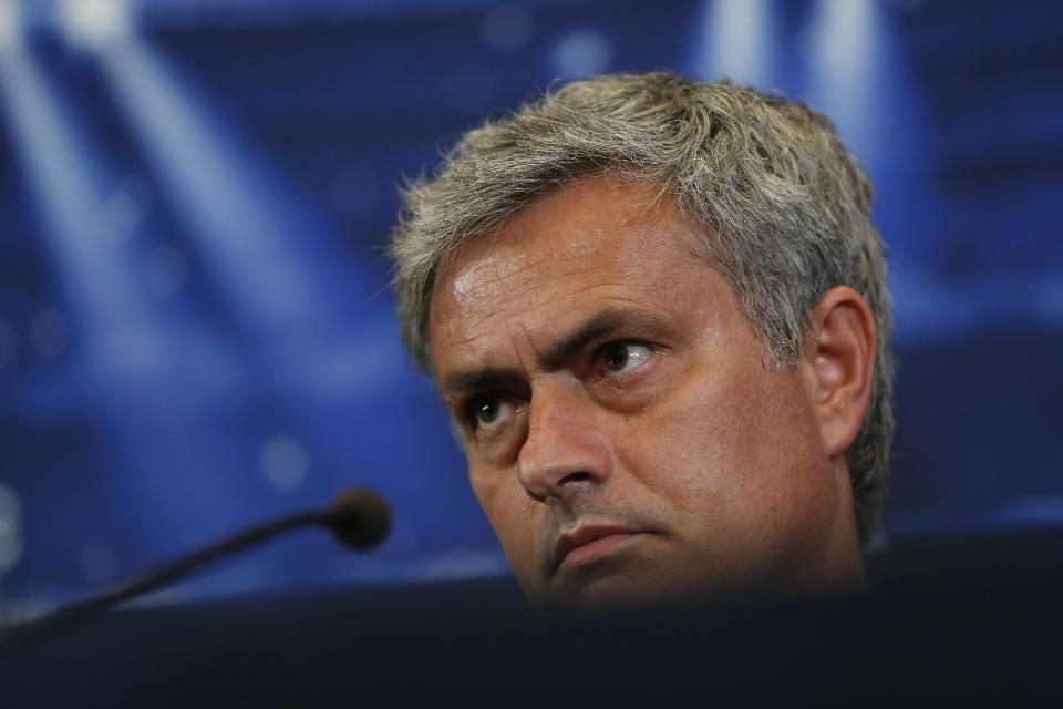 Chelsea's coach Jose Mourinho from Portugal listens to a question during a press conference ahead of Tuesday's Champions League, semifinal, first leg, soccer match against Atletico Madrid, at the Vicente Calderon stadium, in Madrid, Spain, Monday, April 21, 2014. (AP Photo/Andres Kudacki)