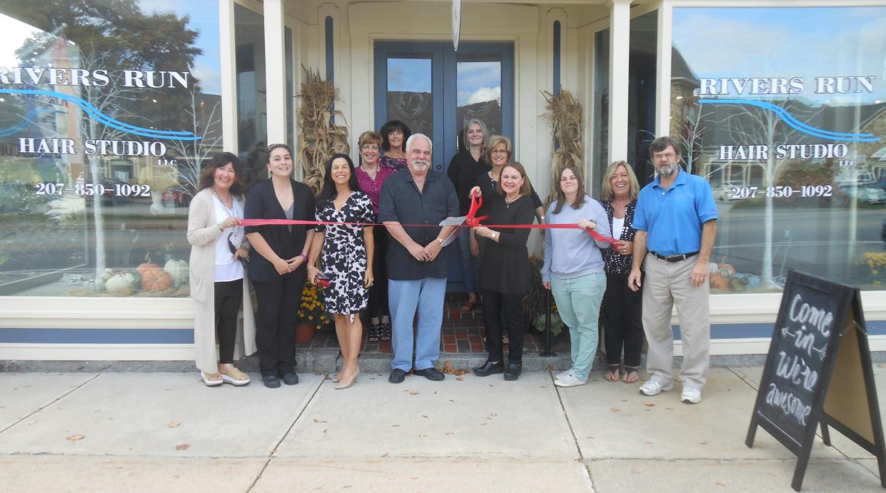 Rivers Run Hair Studio to cut the ribbon at their new Springvale location. Pictured front left to right Evelyn Libby Fresh Start Boutique, Liz Kilkenny Best in Business Marketing & Consulting, Suzanne McKechnie InvestComm Commercial Group, cutting the ribbon are Rivers Run Owners Steve and Charline Edwards, Rebecca Lapierre Town Square Realty and Chamber Board Chair, Caren Martineau Batchelder Brothers Insurance, and Rick Stanley Chamber President. Back row left to right Studio Professionals Gloria Calcaterra, Kathy Stewart, Patty Libby, and Janeen Owens.