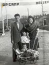 In this photo provided by Israel Eisenberg, Israel "Sasha" Eisenberg, center, is photographed with his parents and younger brother Moty at the Hallein Displaced Persons Camp in Austria in 1947 after World War II. Eisenberg recently became reunited, after more than 70 years, with fellow Holocaust survivor Ruth Brandspiegel, whom he met at the displaced camp in Austria where they became friends. (Courtesy of Israel Eisenberg via AP)