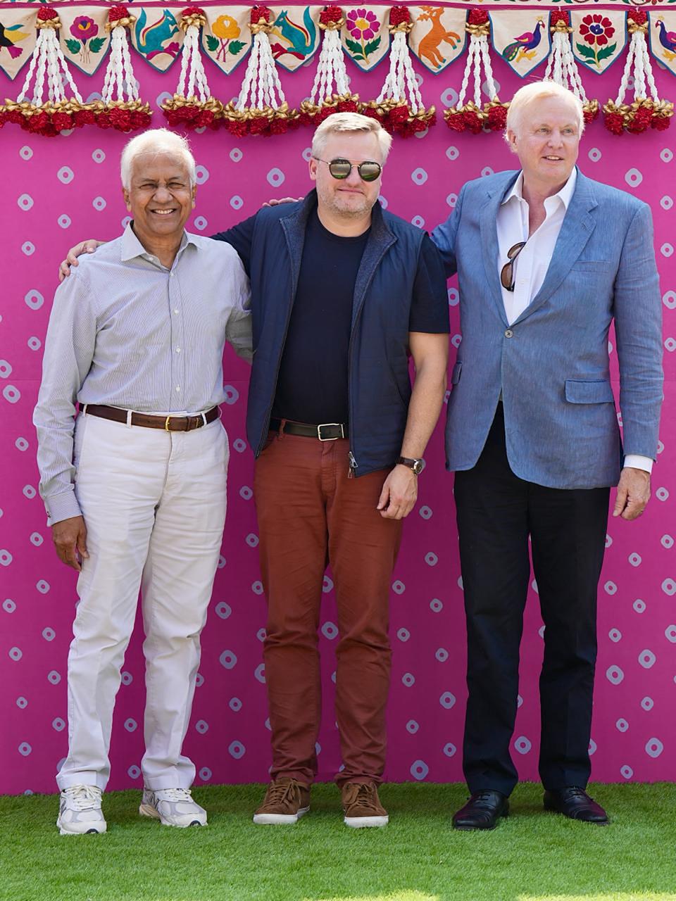 Bob Dudley (R), former chief executive officer (CEO) at British oil giant BP, Murray Auchincloss (C), present CEO at BP and executive director at Reliance Industries P.M.S. Prasad upon their arrival at Jamnagar Airport in Jamnagar.