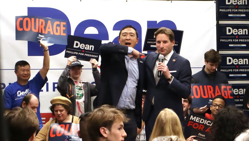 Andrew Yang, left, and Minnesota Rep. Dean Phillips, Democratic candidate for president, address a crowd at the Hanover Inn in Hanover, N.H., on Thursday, Jan. 18, 2024.