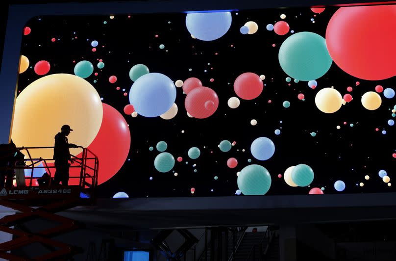 A worker helps set up the Google booth before CES International, in Las Vegas, January 2020