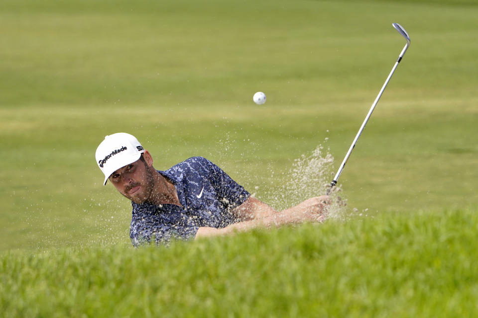 Matthew Wolff plays a shot from a bunker on the tenth hole during the third round of the U.S. Open Golf Championship, Saturday, June 19, 2021, at Torrey Pines Golf Course in San Diego. (AP Photo/Jae C. Hong)