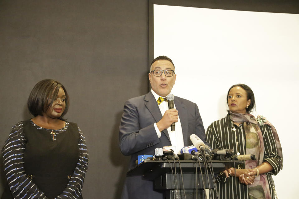 Cabinet Secretary ministry of tourism and wildlife Najib Balala, centre, addresses the public during the reopening of the DusitD2 hotel complex in Nairobi, Kenya, Wednesday, July 31, 2019, with CS Defence Rachael Omamo, left, and CS Education Amina Mohammed, right. Kenya has reopened the luxury hotel complex after the January deadly attack by Muslim extremists al-Shabab which left twenty-one people dead.(AP Photo/Khalil Senosi)