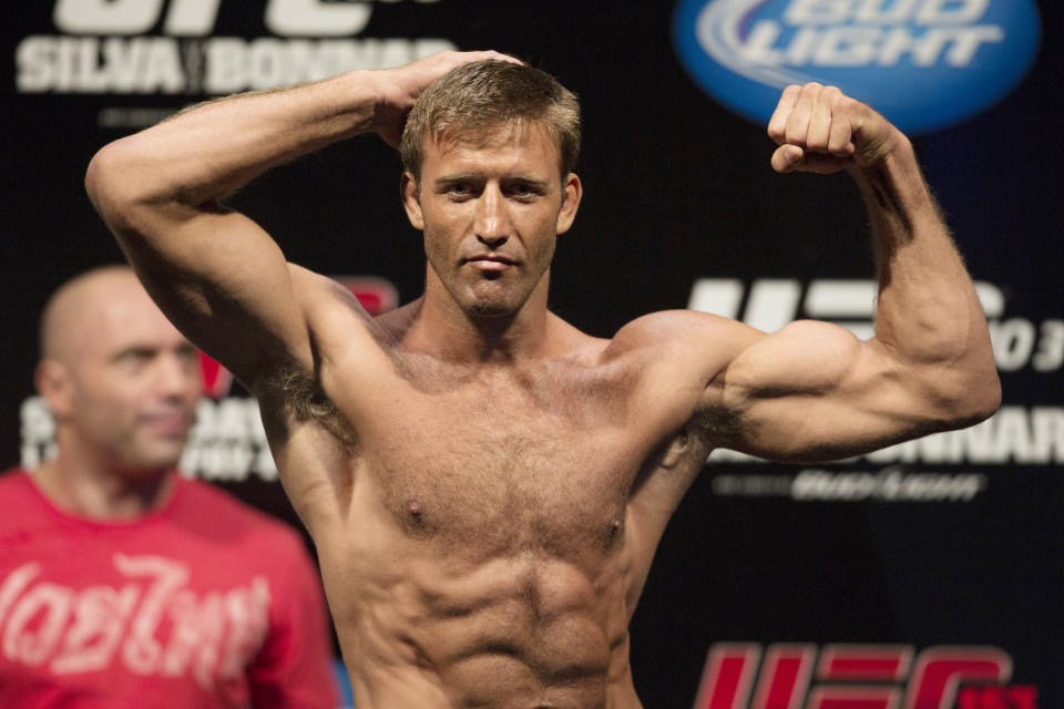FILE - Mixed martial arts fighter Stephan Bonnar, of the United States, poses during the Ultimate Fighting Championship (UFC) 153 weigh-in event in Rio de Janeiro, Oct. 12, 2012. UFC says former fighter Bonnar, who played a significant role in the UFC’s growth into the dominant promotion in mixed martial arts, has died. The UFC Hall of Famer was 45. UFC announced in a statement that Bonnar died Thursday, Dec. 22, 2022, from “presumed heart complications while at work.” (AP Photo/Felipe Dana, File)