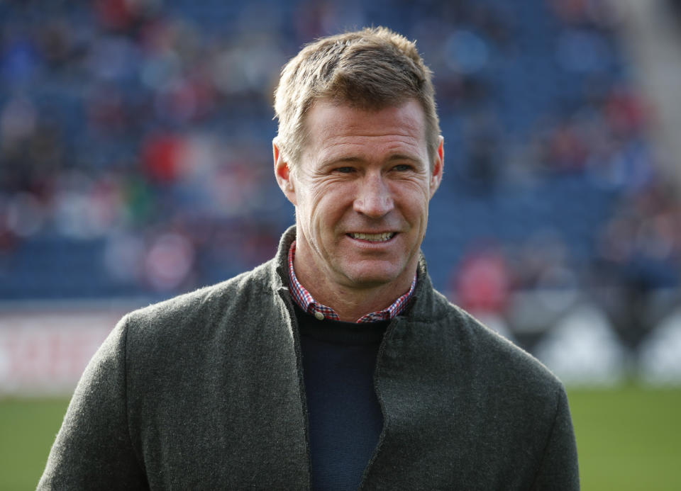 FILE - Brian McBride waits for an MLS soccer match between the Chicago Fire and Portland Timbers, March 31, 2018, in Bridgeview, Ill. McBride is out as general manager of the U.S. men's national team, U.S. Soccer Federation sporting director Earnie Stewart told the governing body's board of directors. (AP Photo/Kamil Krzaczynski, File)