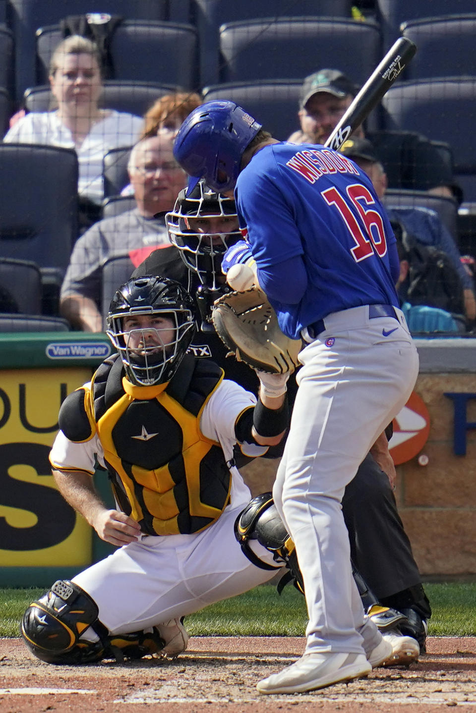 Chicago Cubs' Patrick Wisdom (16) is hit by a pitch from Pittsburgh Pirates relief pitcher Duane Underwood Jr. during the seventh inning of a baseball game in Pittsburgh, Sunday, Sept. 25, 2022. (AP Photo/Gene J. Puskar)