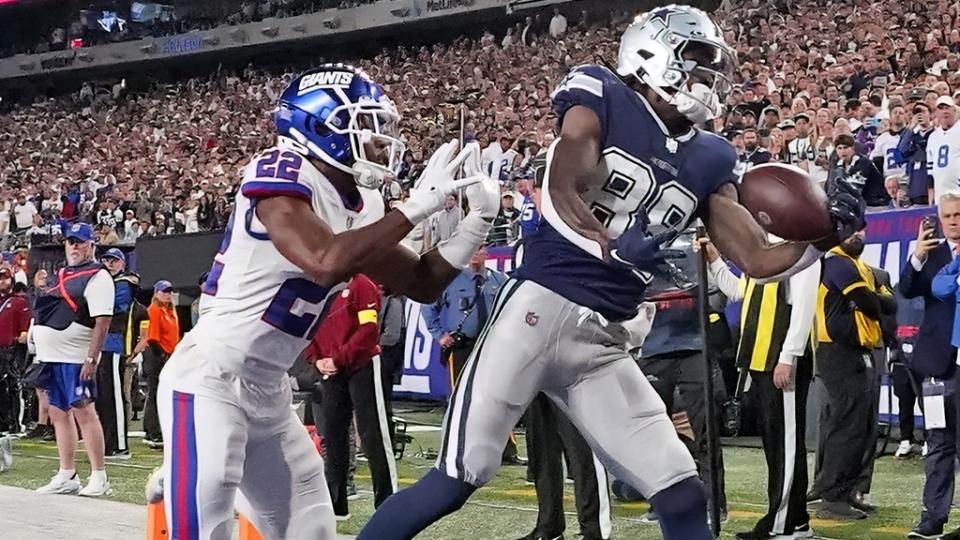 Sep 26, 2022; East Rutherford, NJ, USA; Dallas Cowboys wide receiver CeeDee Lamb (88) makes a touchdown catch over New York Giants cornerback Adoree' Jackson (22) during the second half at MetLife Stadium.